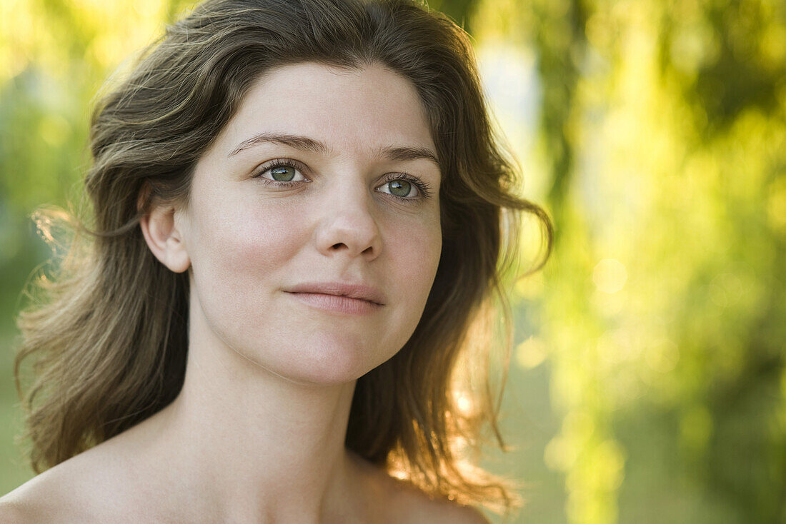 Young woman outdoors, portrait