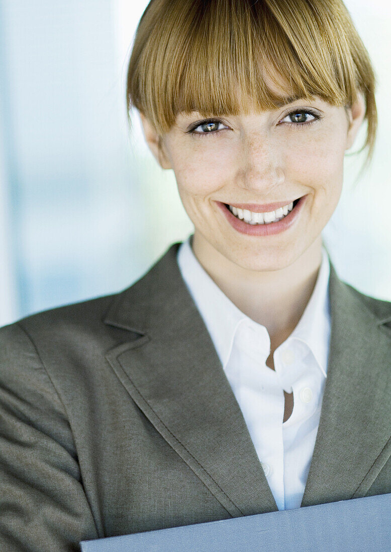 Businesswoman smiling at camera, portrait