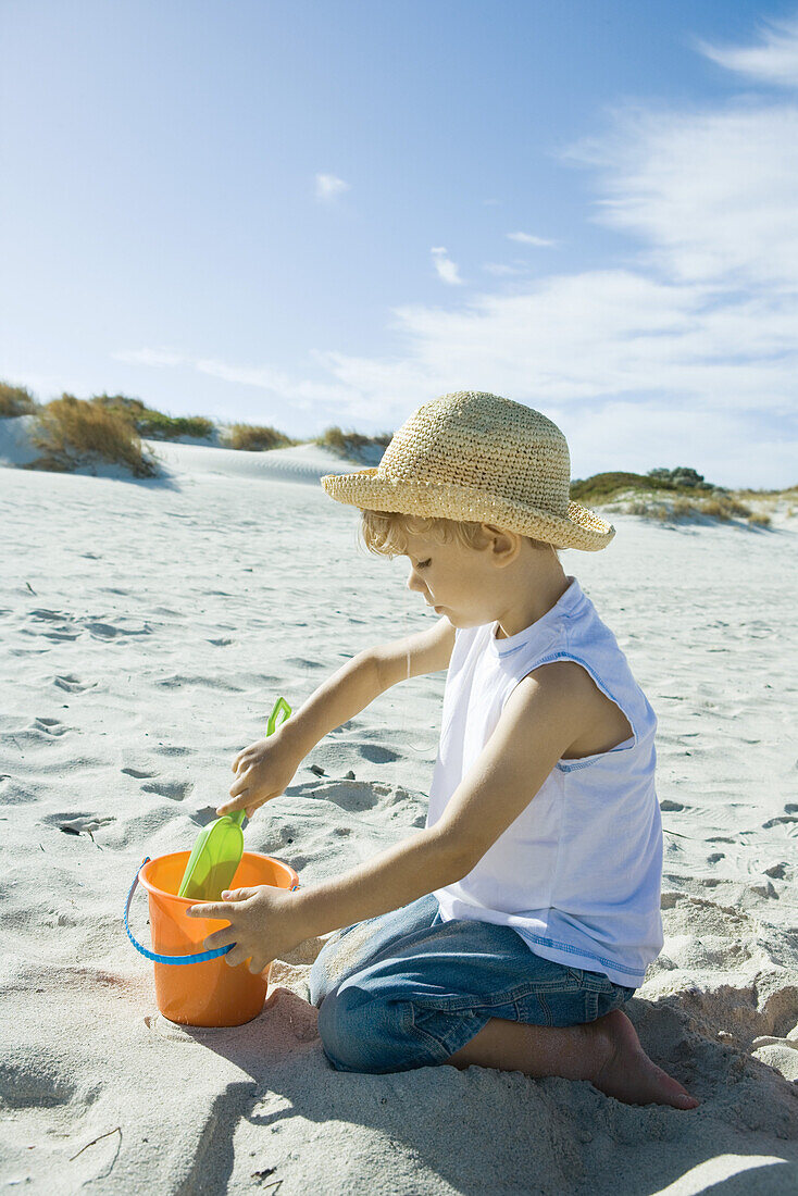 Child playing in sand