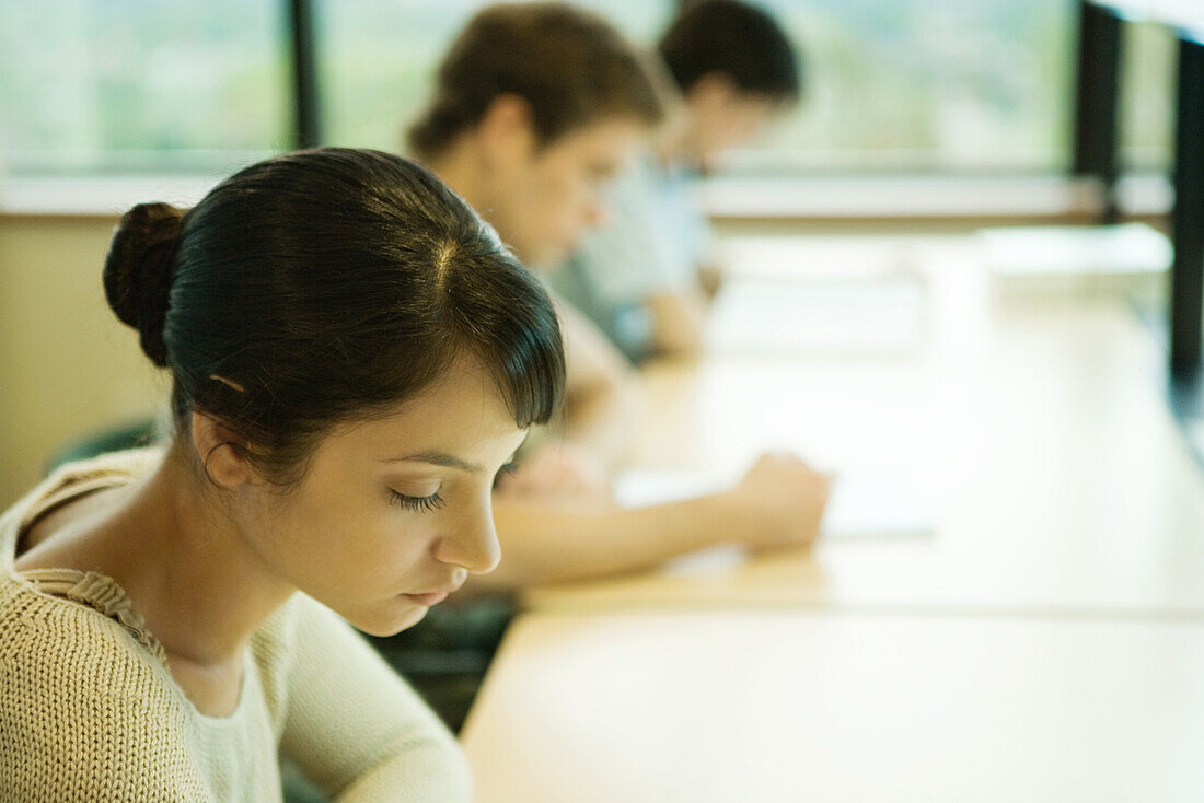 Students studying in university library