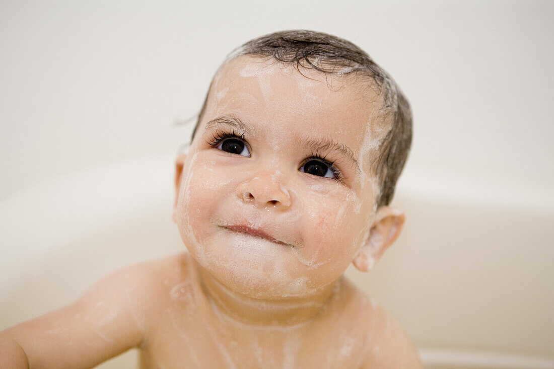 Soapy baby in bath