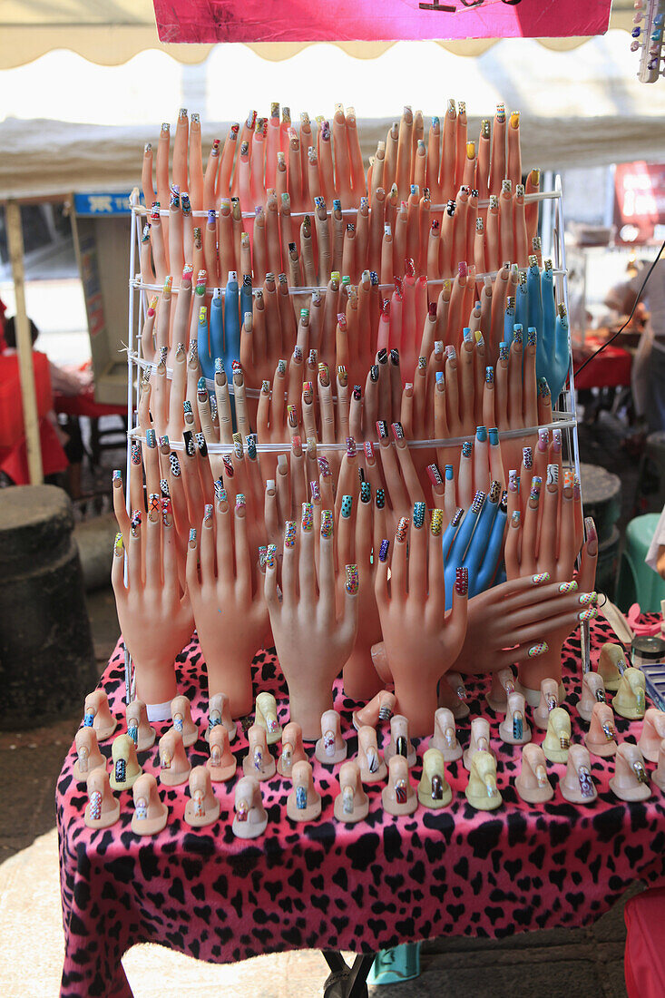 Artificial painted fingernails displayed at store