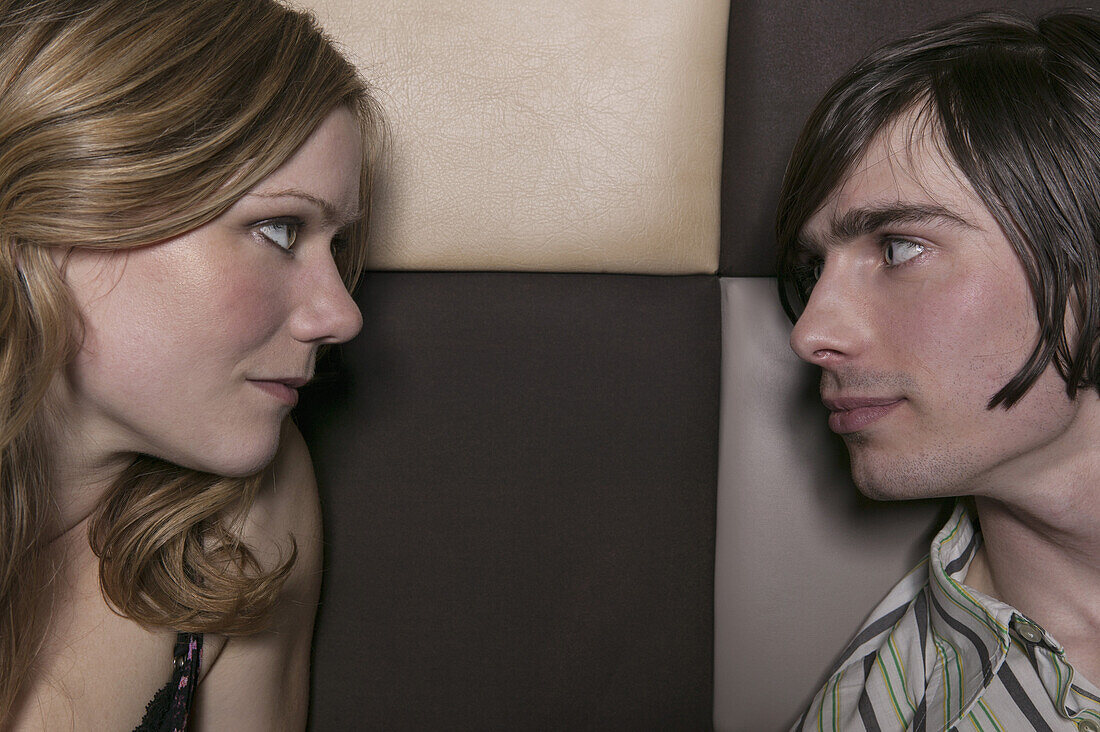 A couple looking at each other intensely, close-up
