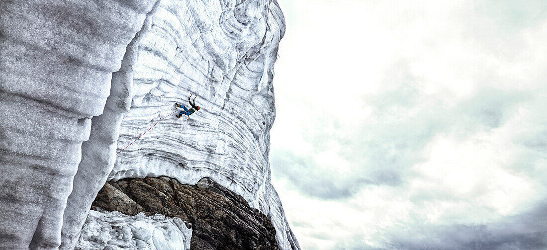 Ice climber on icefall, Hintertux Glacier, Hintertux, Tyrol, Austria