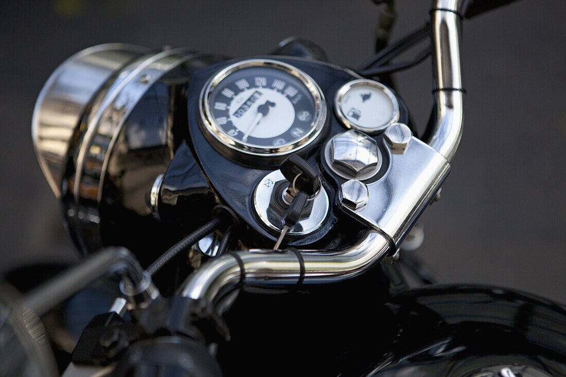 Motorcycle dashboard with keys in the ignition