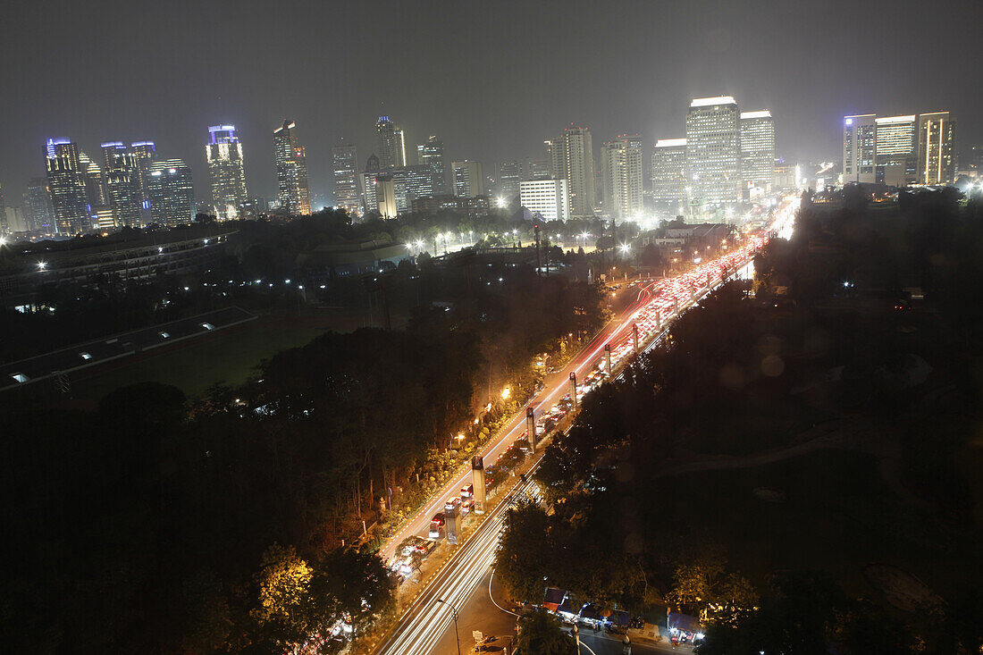 High angle view of the city streets of Jakarta at night, Indonesia