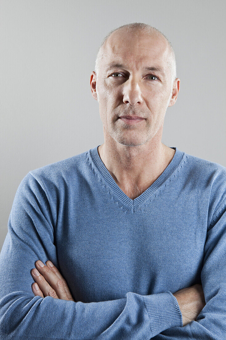 A man with his arms crossed, portrait