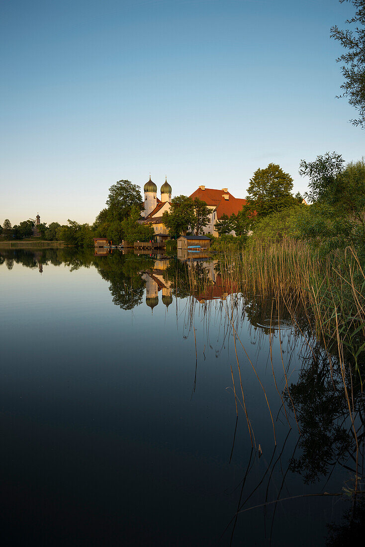 Seeon Monastery and Lake Seeon with reflection, Seeon-Seebruck, Chiemgau, Upper Bavaria, Bavaria, Germany