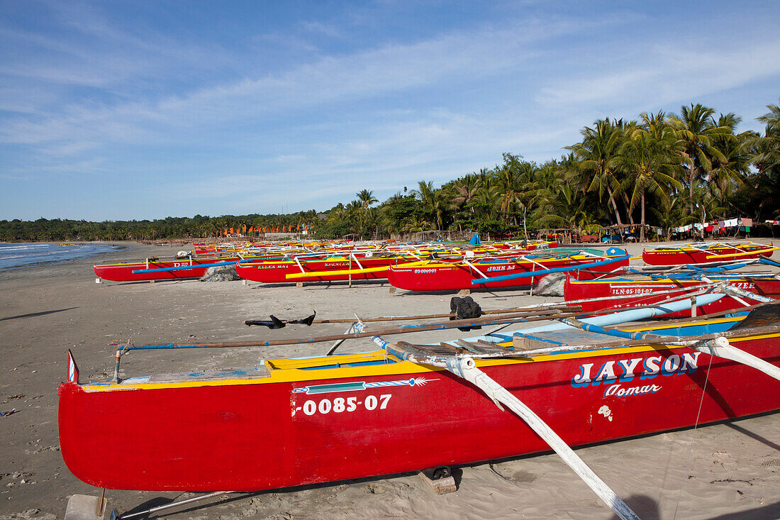 Fishing boats at Pug-Os Beach near Laoag City, Ilocos Norte province on the main island Luzon, Philippines, Asia
