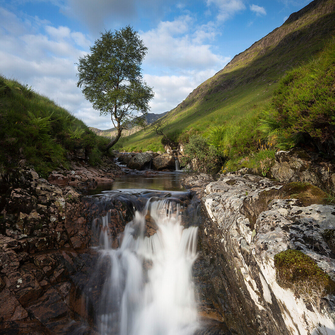 Waterfall in mountains, Argyll and Bute, Highland, Scotland, United Kingdom