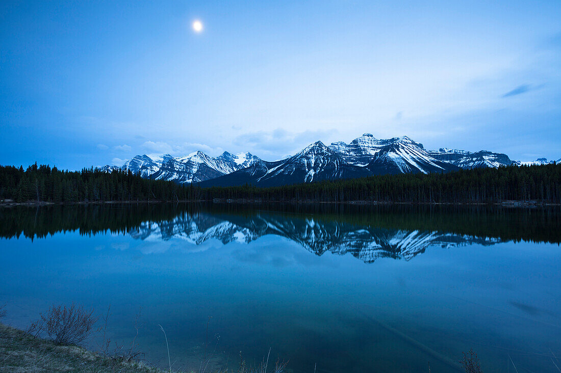 Mountains reflecting in a lake, Banff National Park, Icefields Parkway, Alberta, Rocky Mountains, Canada