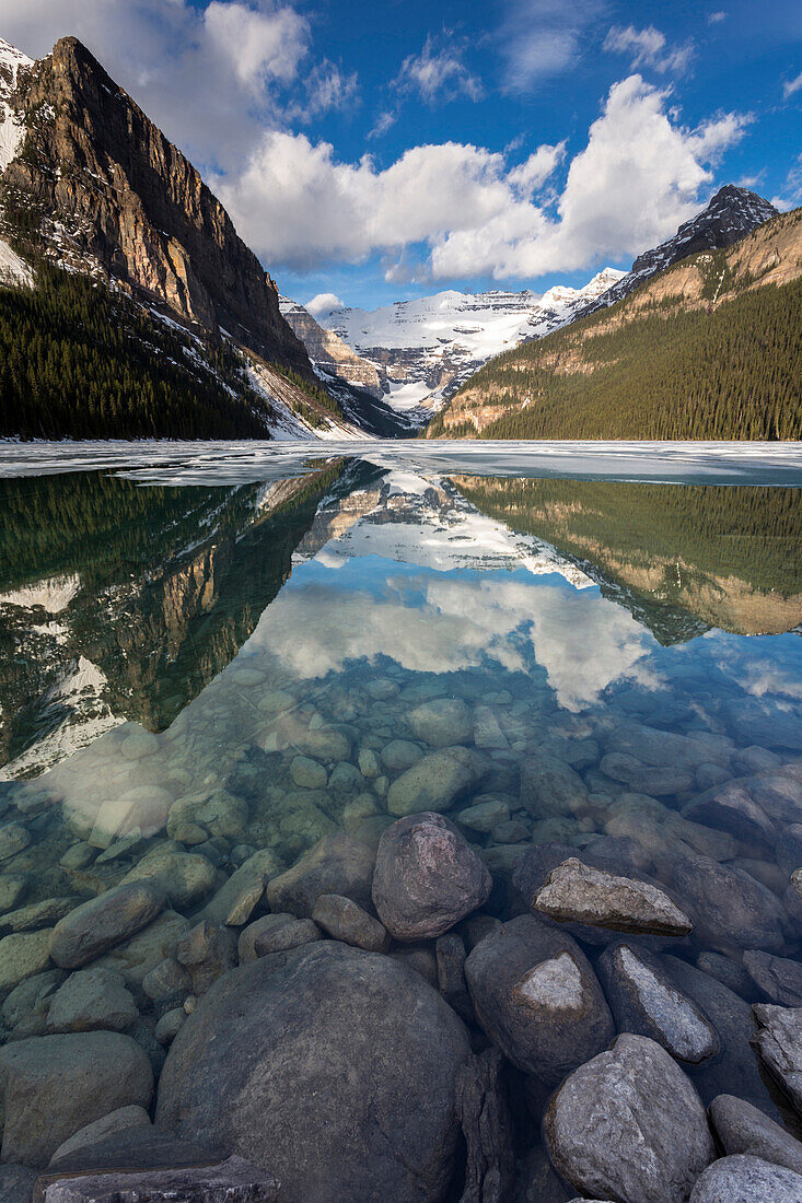 Mountains reflecting in a lake, Banff National Park, Icefields Parkway, Alberta, Rocky Mountains, Canada