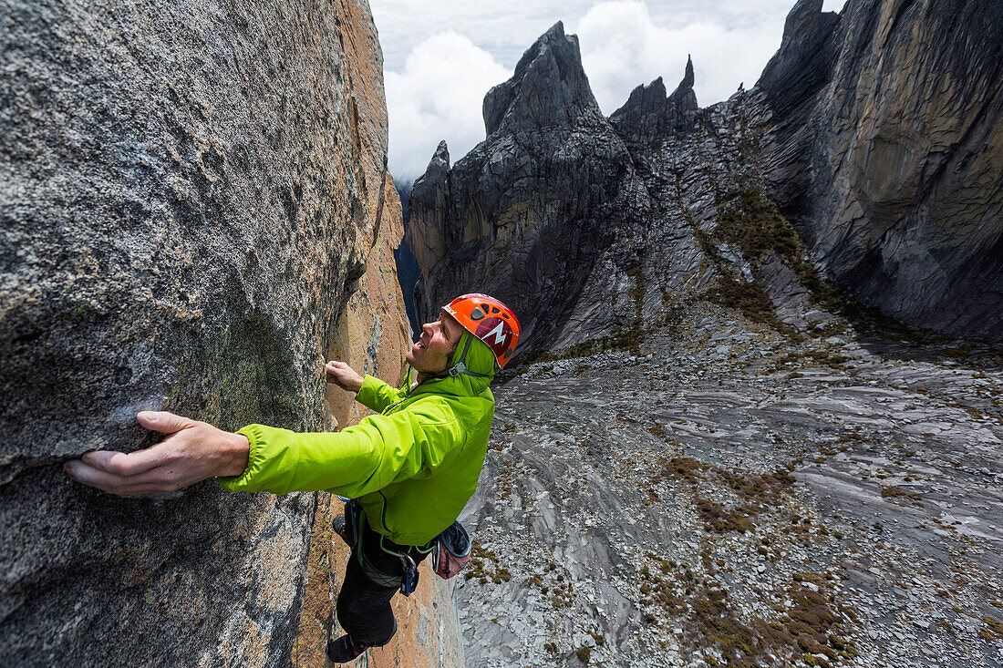 Christian Schlesener climbing the 1. pitch 8a Walk the line on  Victoria Peak, Mount Kinabalu, Borneo, Malaysia