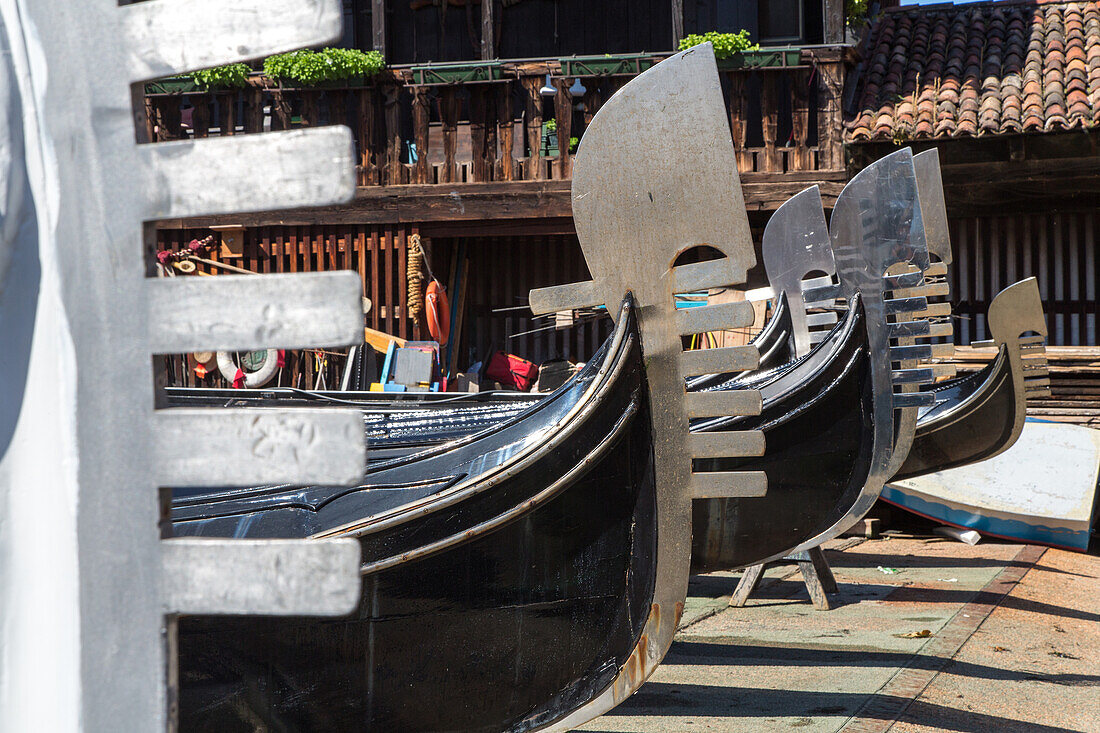 Lorenzo della Toffola, traditional gondola boat builder, dry dock, maintenance, black lacquer, decoration, Dorsoduro, Venice, Veneto, Italy