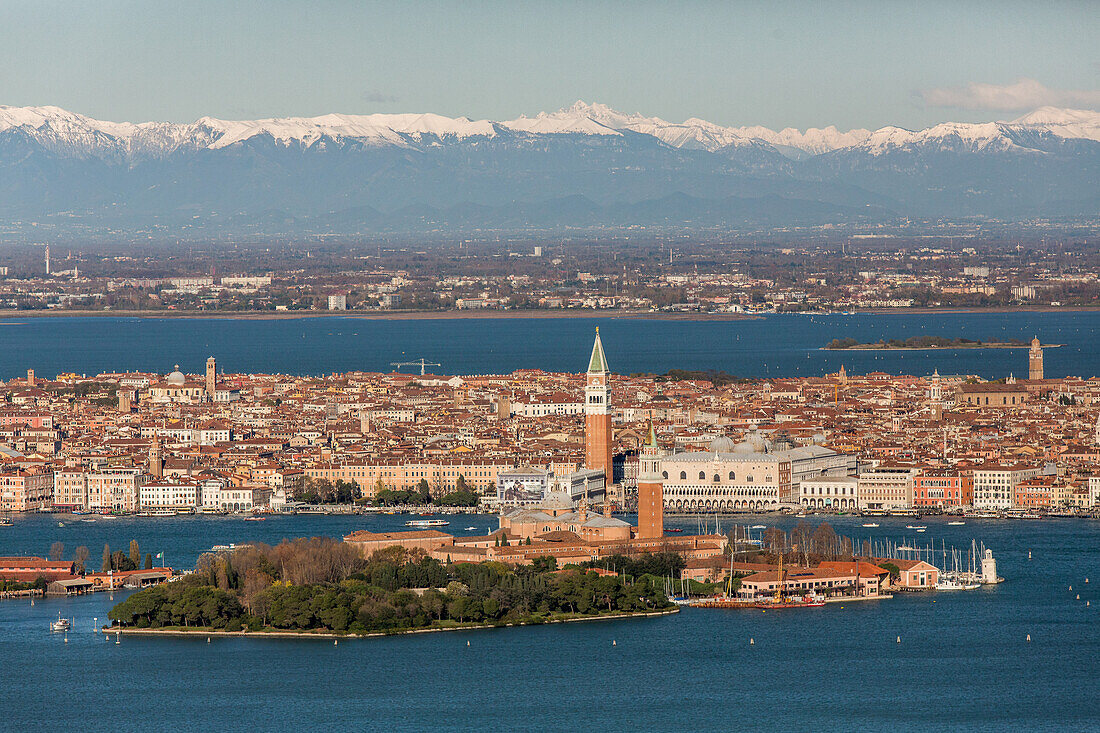 aerial shot above Venice, panorama, island of San Giorgio Maggiore, San Marco, St Mark's Square, Giudecca, snow peaks, Alps, Dolomites, lagoon, panorama, Venice, Italy