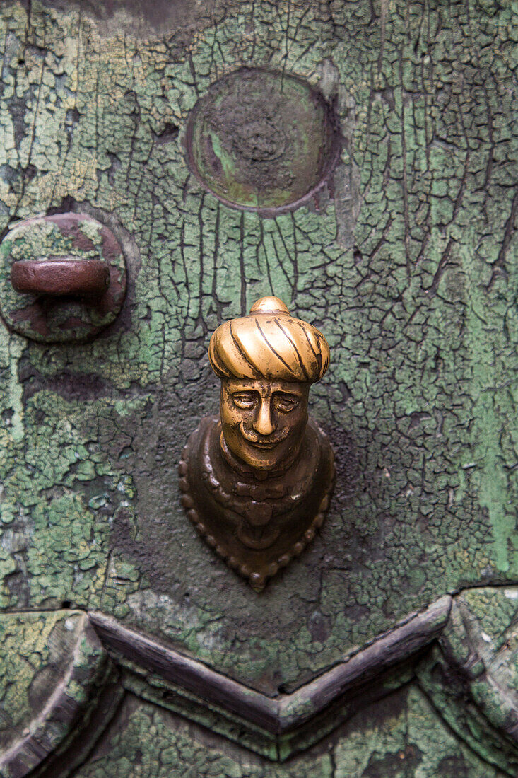 Venetian doorknobs, decorative, polished, worn, Venice Italy