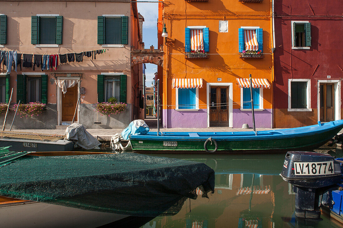 Burano Island, coloured houses, canal, boats, lagoon, Venice, Italy
