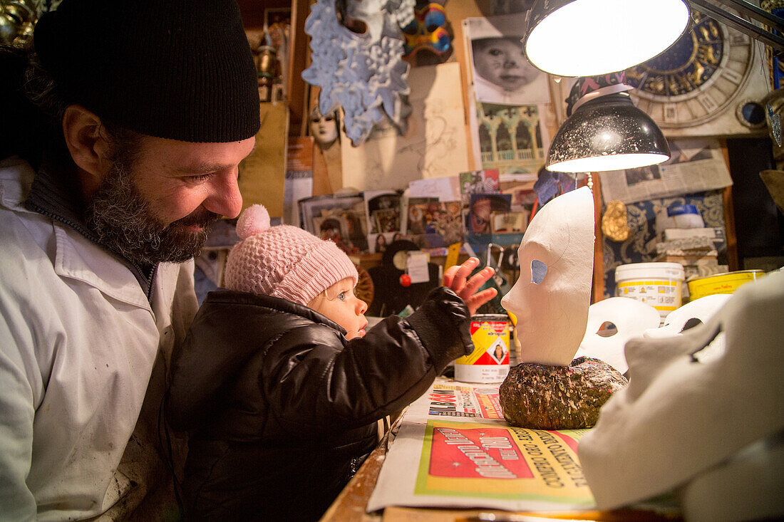 Leonardo Faggian, and child, mask maker, Mistero Buffo studio in Dosoduro, carnival, handcraft Venice, Italy