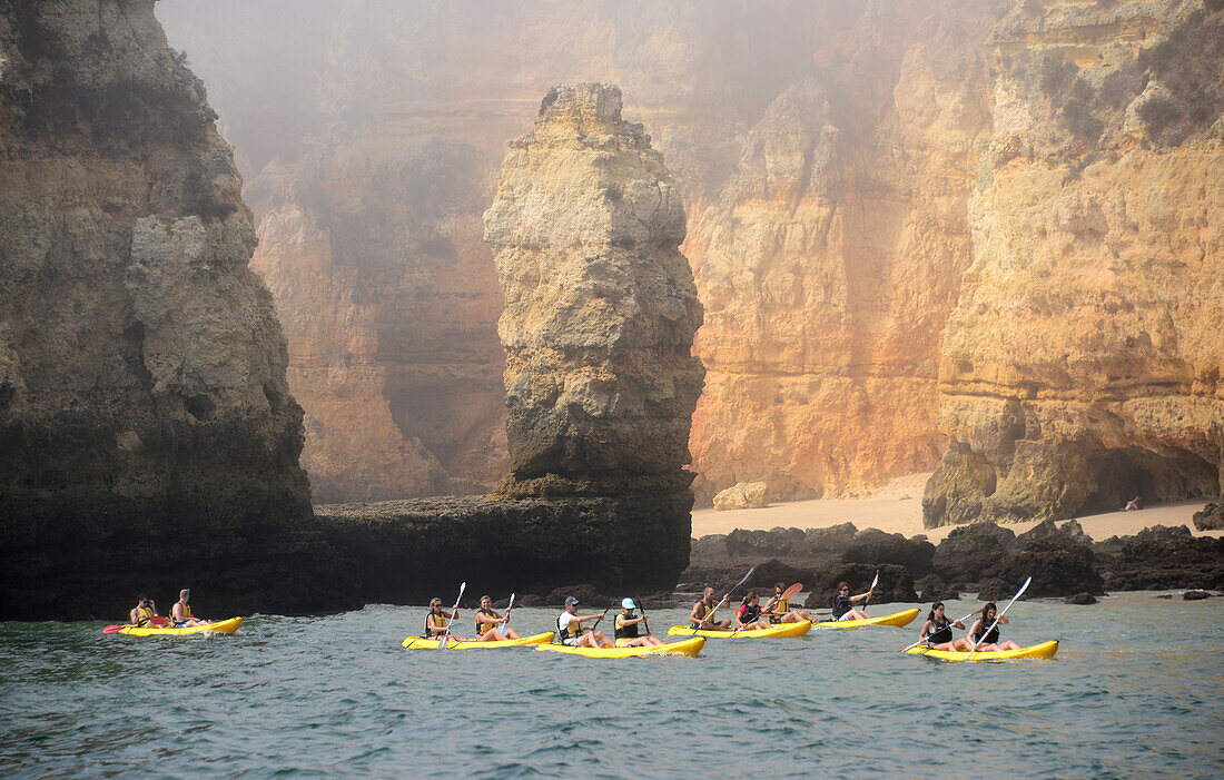 Canoeists near Ponta Piedade near Lagos, Algarve, Portugal