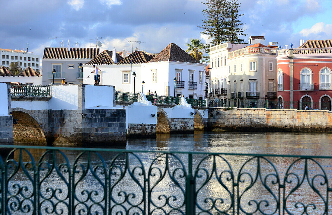 Old bridge at Rio Gilao in Tavira, Algarve, Portugal