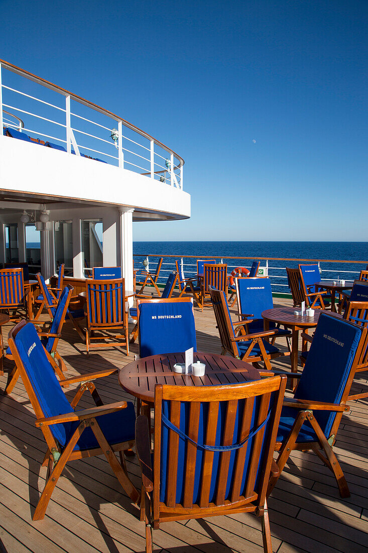 Outdoor seating at bar Zum Alten Fritz aboard cruise ship MS Deutschland (Reederei Peter Deilmann), Atlantic Ocean, near Portugal