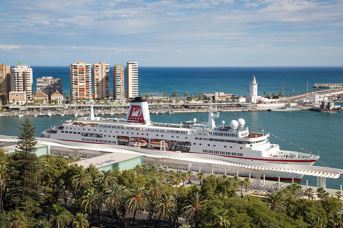 Palm trees and cruise ship MS Deutschland (Reederei Peter Deilmann) at Malaga Cruise Terminal, Malaga, Andalusia, Spain