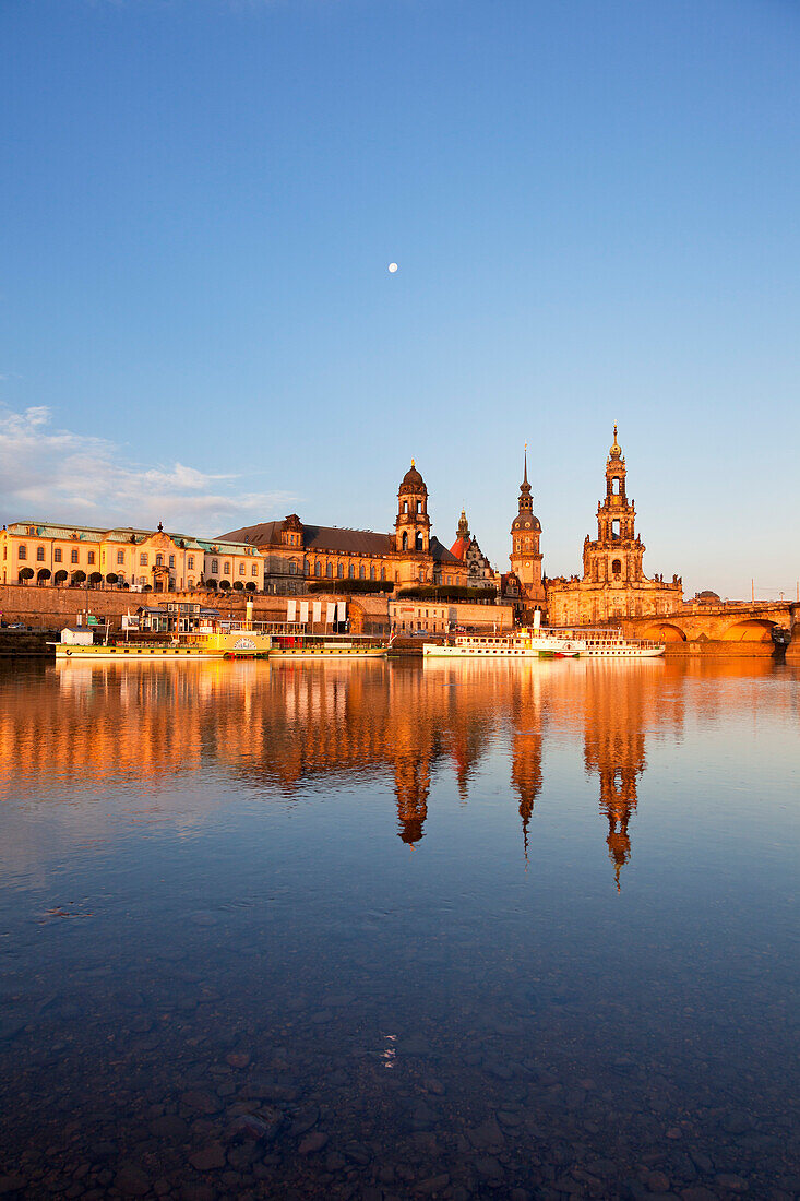 Morning mood, reflection of the Staendehaus, Residenzschloss and Hofkirche in the river Elbe, Dresden, Saxony, Germany