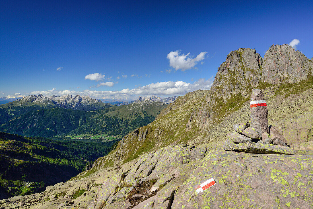 Path with trail marker and Latemar range in the background, Trans-Lagorai, Lagorai range, Dolomites, UNESCO World Heritage Site Dolomites, Trentino, Italy