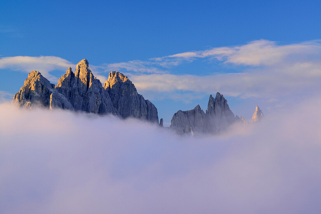 Cadini range emerging out of clouds, Auronzo alpine hut, Auronzo Huette, Drei Zinnen, Tre Cime di Lavaredo, UNESCO World Heritage Site Dolomites, Dolomites, Veneto, Italy
