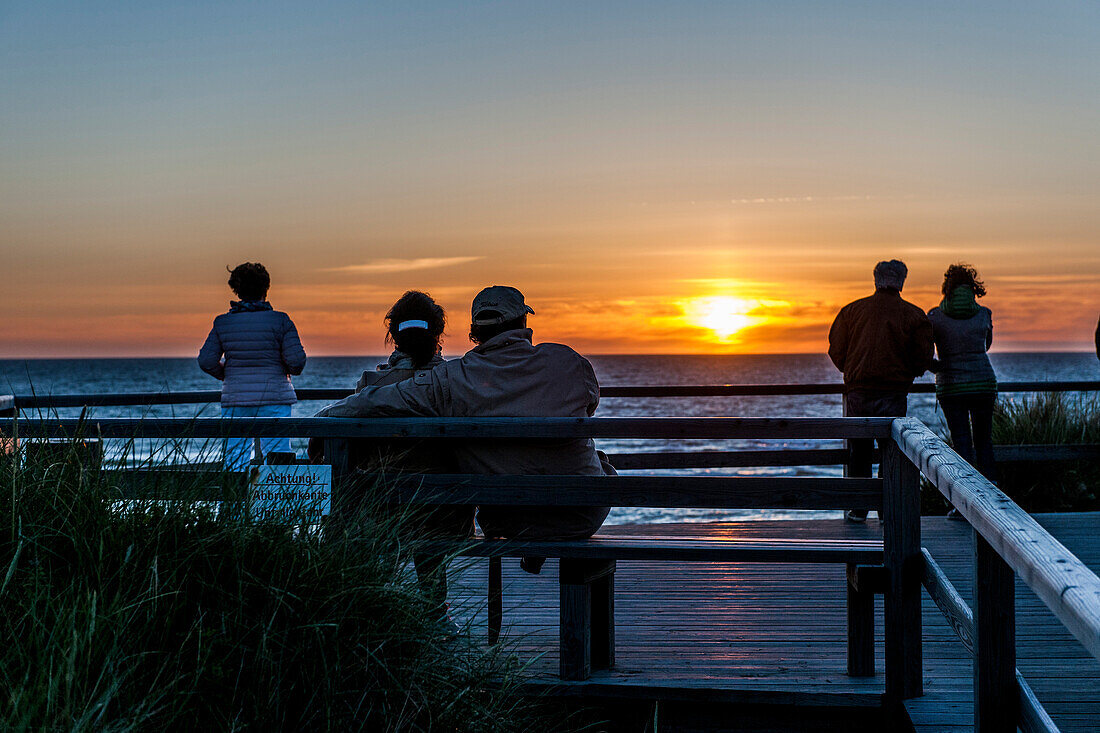 People looking at sunset, Kampen, Sylt, Schleswig-Holstein, Germany