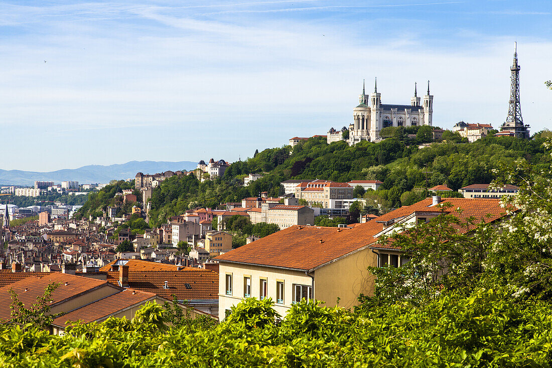 Metallic tower and Basilica of Notre-Dame on the Fourvière Hill, historic district of Vieux, UNESCO World Heritage, Lyon, France, Europe.