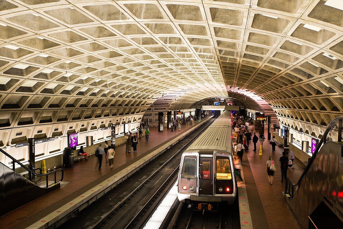 Commuter waits for metro, Washington DC, USA.