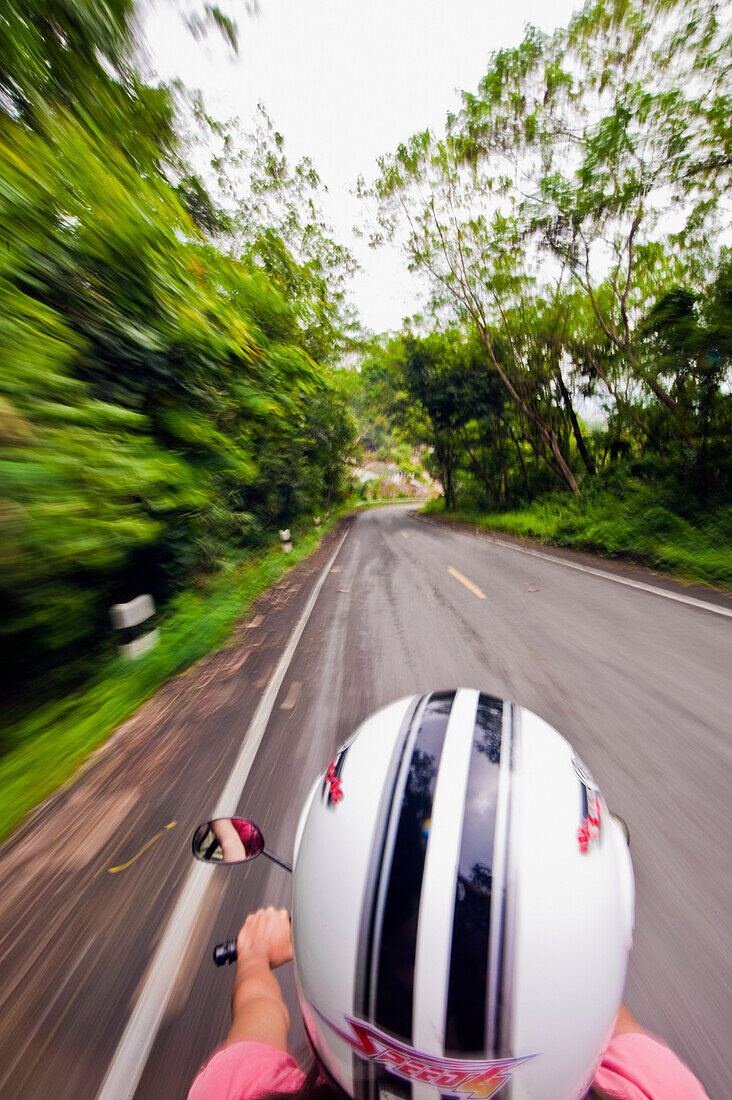 Thailand, Mae Sai, Bird's Eye View Of Motorbike Driving On Country Road.