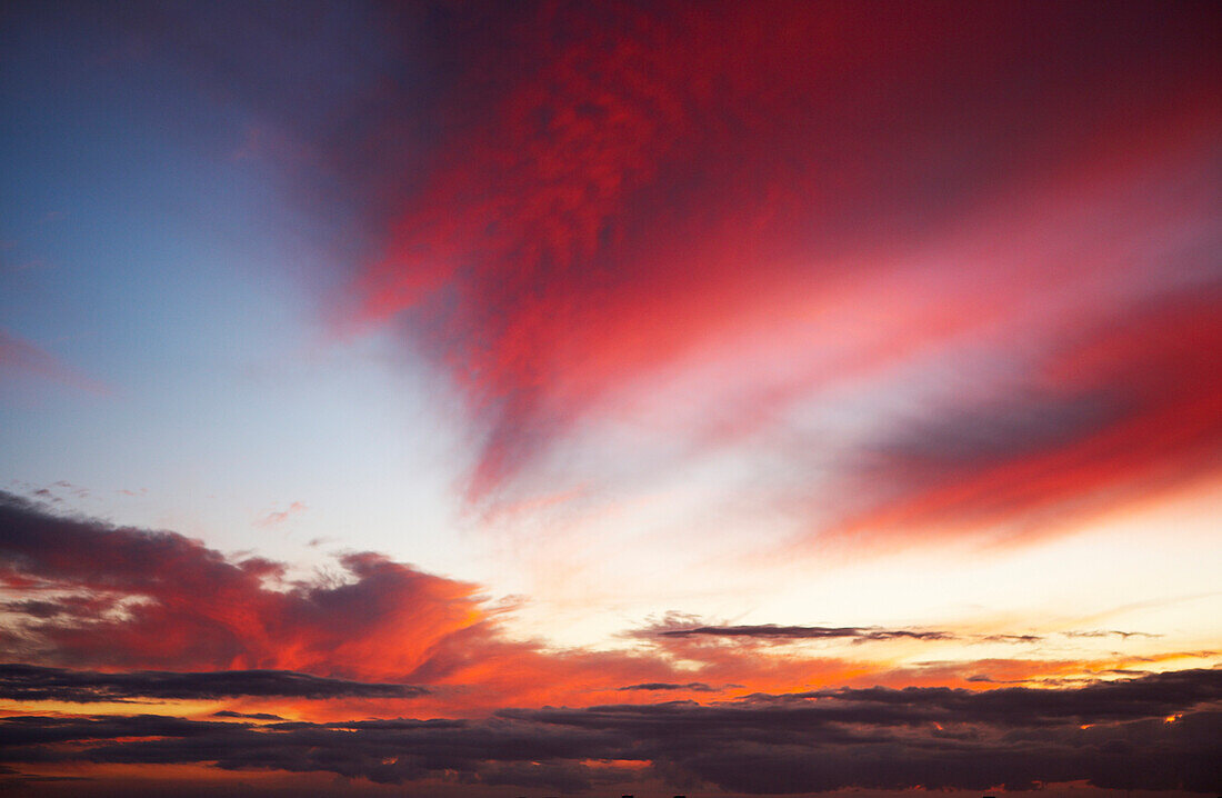 Hawaii, Oahu, Beautiful Sunset Creating Colorful Clouds.