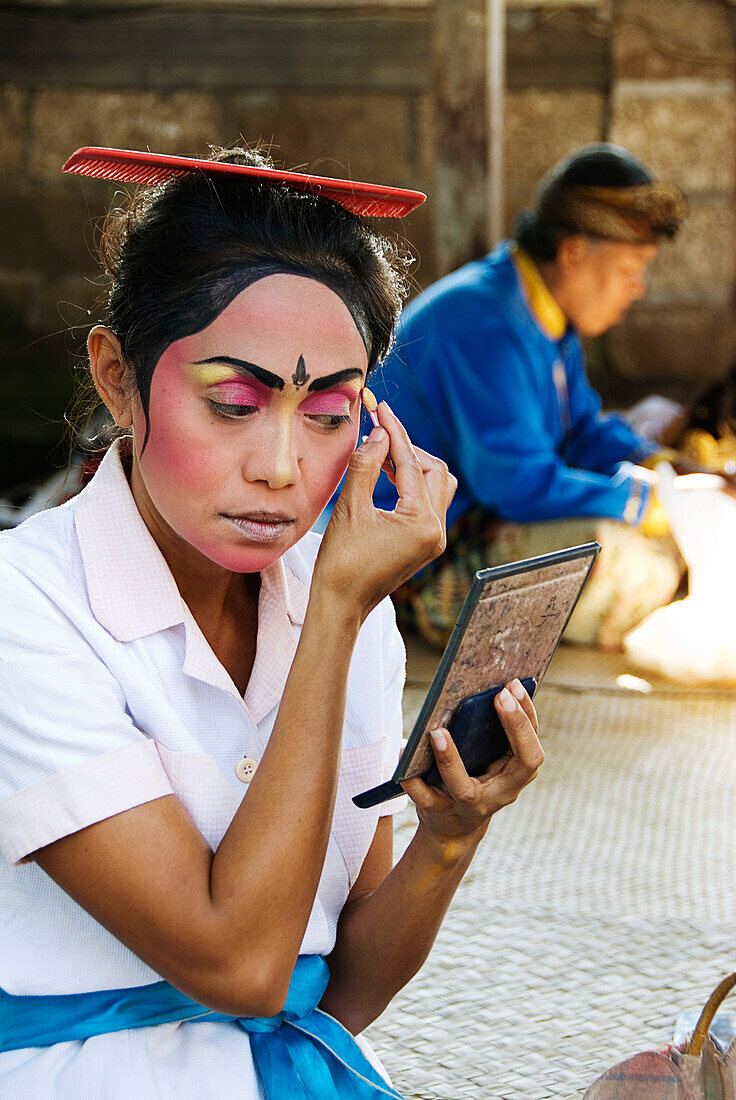 Indonesia, Bali, Batubulan Village, Barong Dance, Barong Dancer Backstage Preparing To Perform.