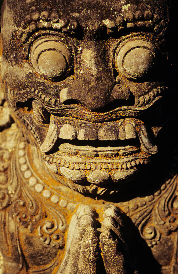 'Close up a stone carving of a face; Hawaii, United States of America'