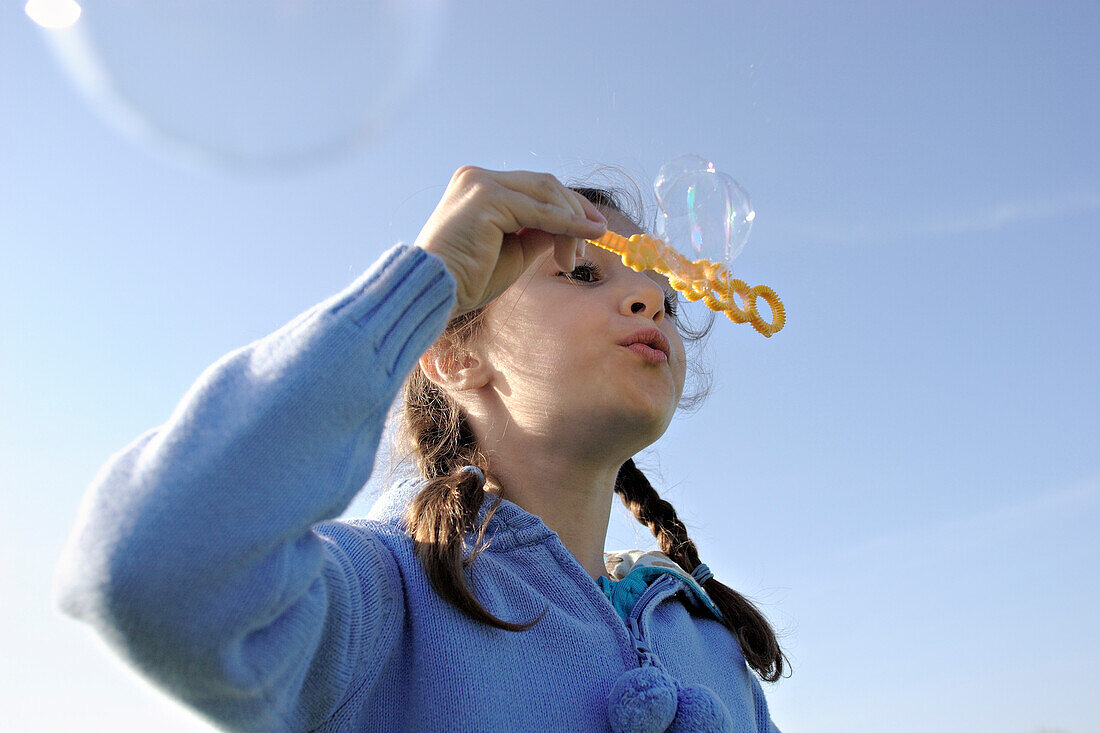 Young Girl Blowing Bubbles, Stayner, Ontario