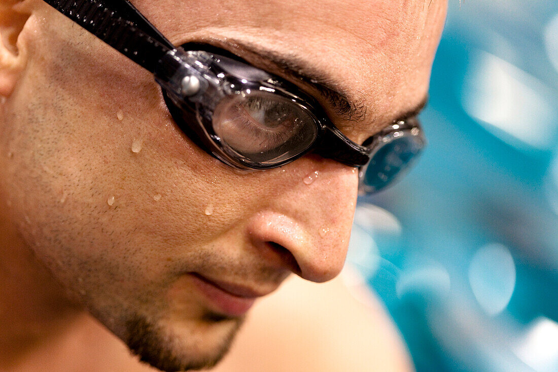 Close Up Of A Man In Goggles After Swimming
