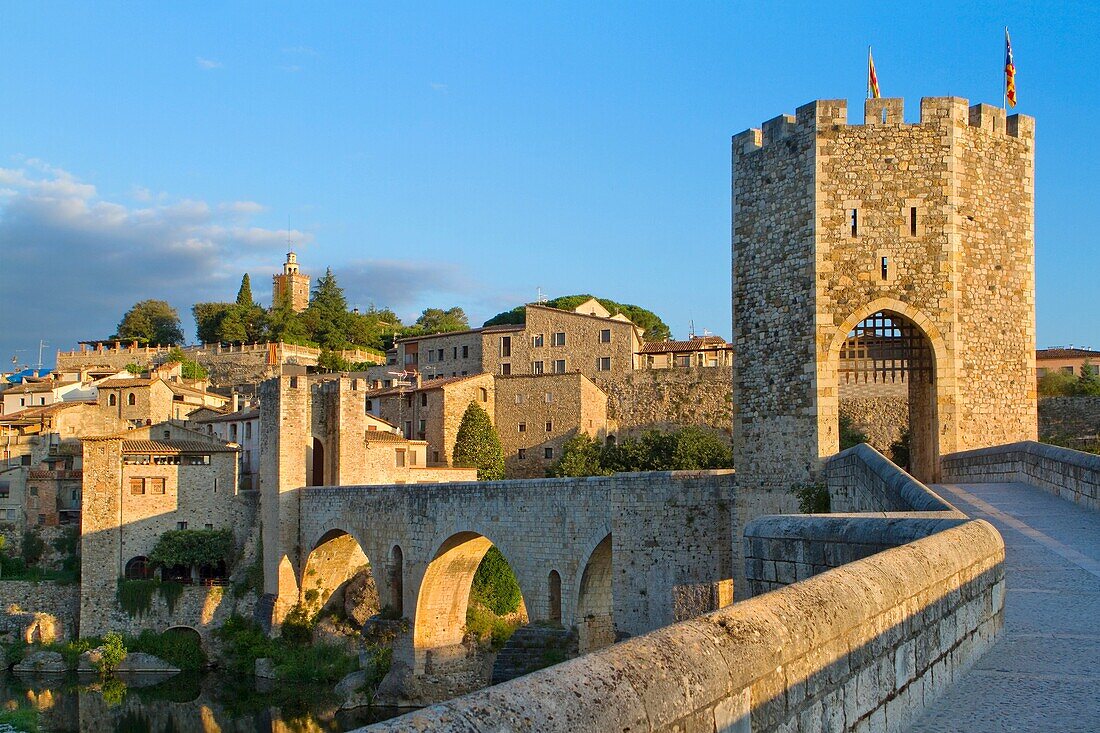 'Medieval Bridge (11th Century), in Besalu, a medieval village declarated Historical-Artistic Site, ubicated in La Garrotxa, Girona province. Catalonia; Spain.'