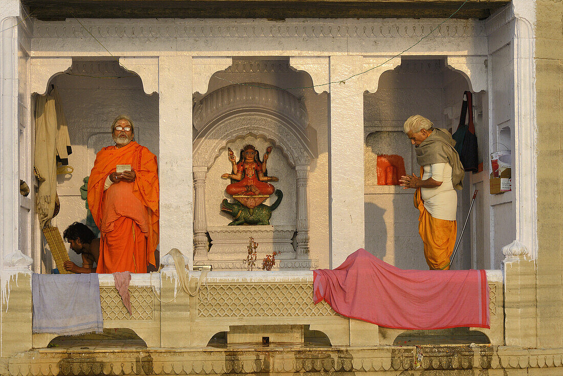 India, Uttar Pradesh, Varanasi, Morning worship at Ganga Mata temple.