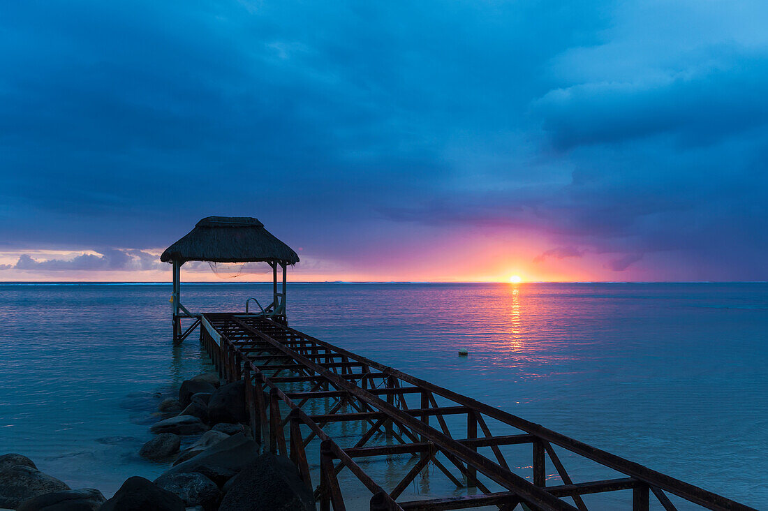 'Old abandoned pier at dusk; Republic of Mauritius'