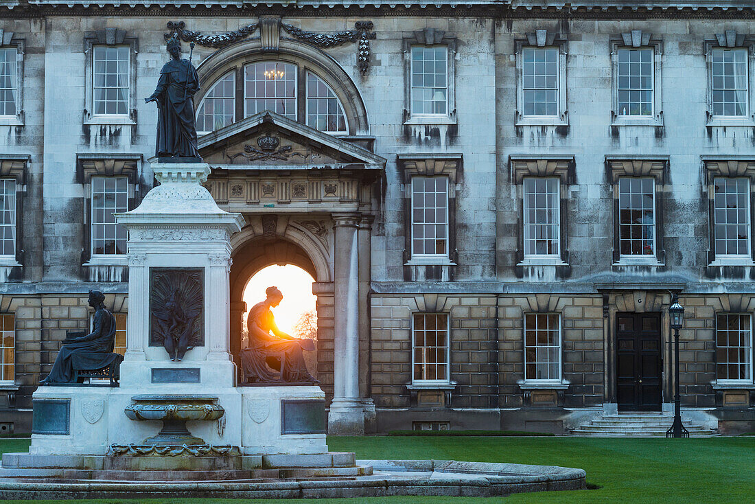 'Founders Fountain and the Gibbs Building of King's College at dusk; Cambridge, Cambridgeshire, England'