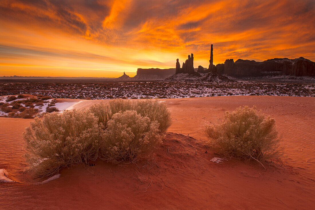 'Winter sunrise over totem formation in Monument Valley Navajo Tribal Park; Arizona, United States of America'