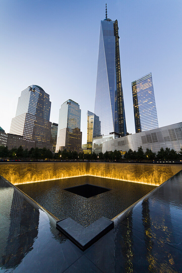 The National September 11 Memorial and One World Trade Center at night, New York City, New York, United States