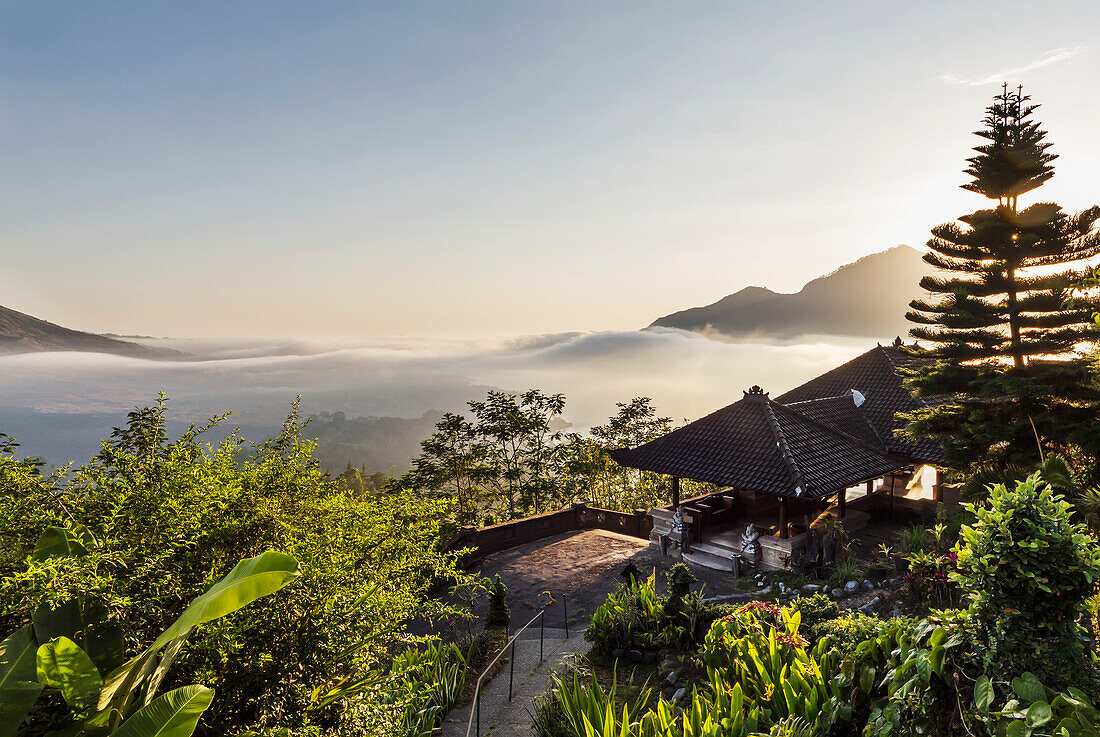 Panoramic view of Batur Lake and Mount Agung at sunrise from Kintamani, Bali, Indonesia