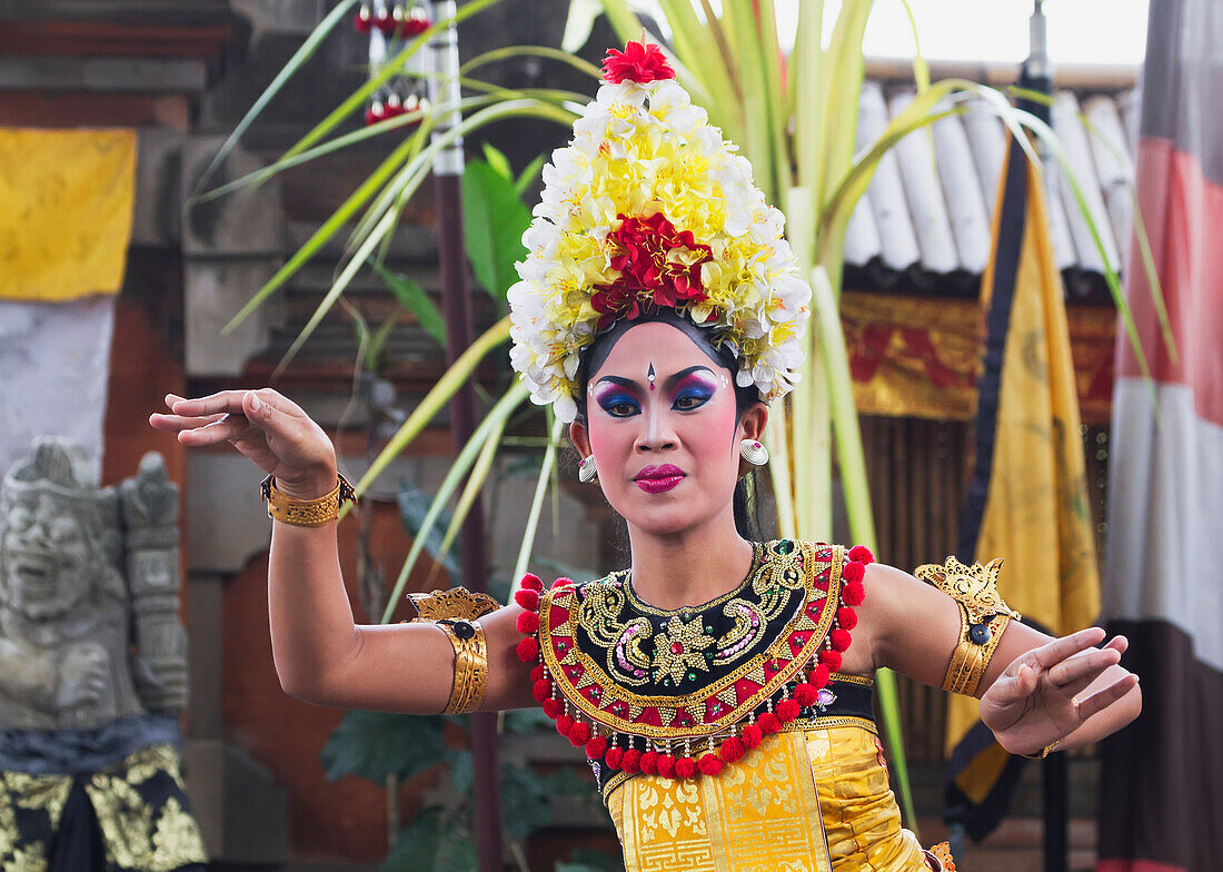 Balinese dancer using codified hand positions and gestures at a Barong dance performance in Batubulan, Bali, Indonesia
