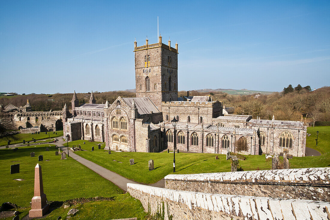 'St. David's Cathedral, built in its present form in 1181, with Bishops Palace in background; St. David, Pembrokeshire, Wales'