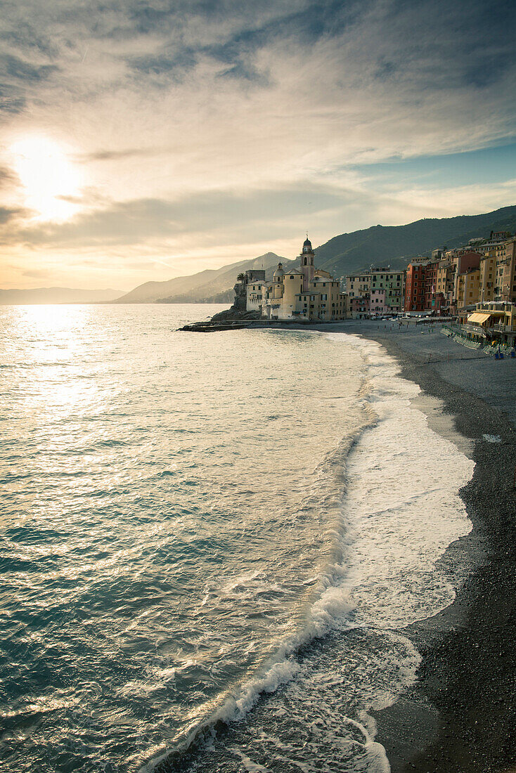 The Italian Riveria town of Camogli at sunset offers visitors stunning Mediterranean seascapes. The Italian Riveria represents the simple life of the ocean.