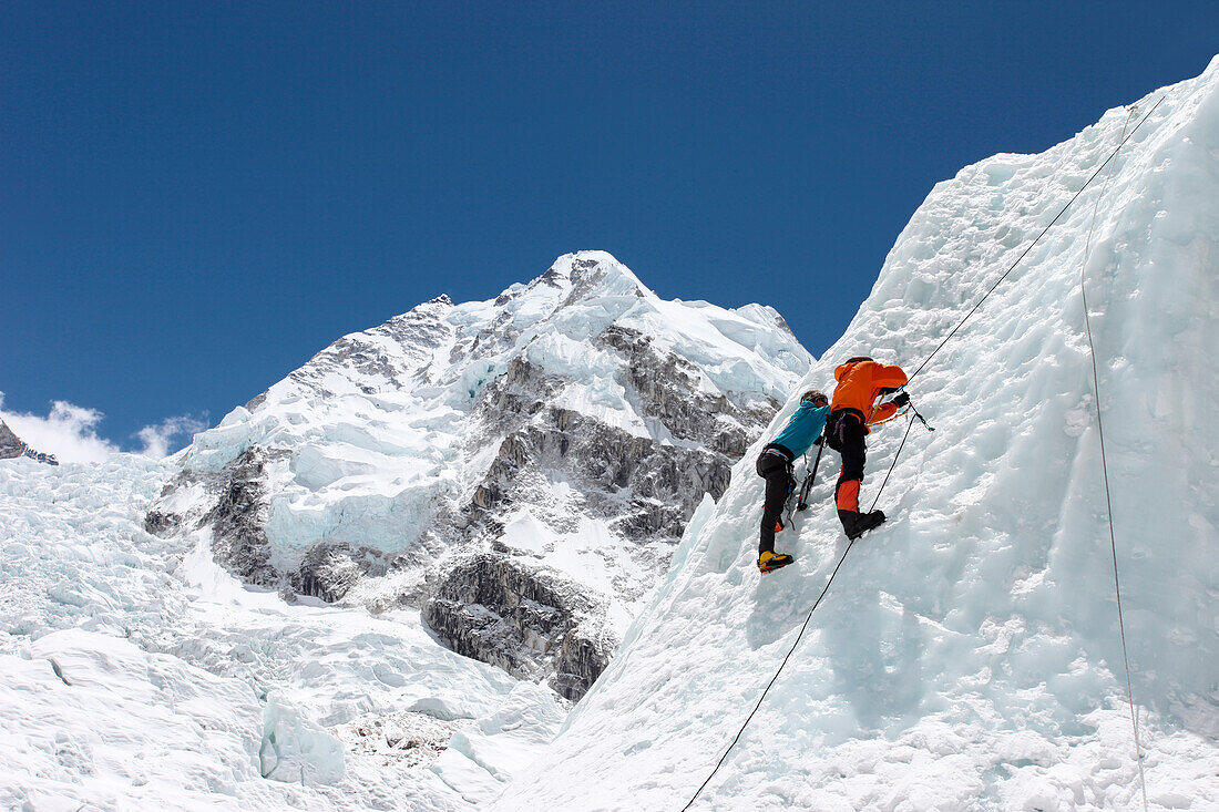 Mountaineers climbing up the Khumbu Icefall on the route up Everest.