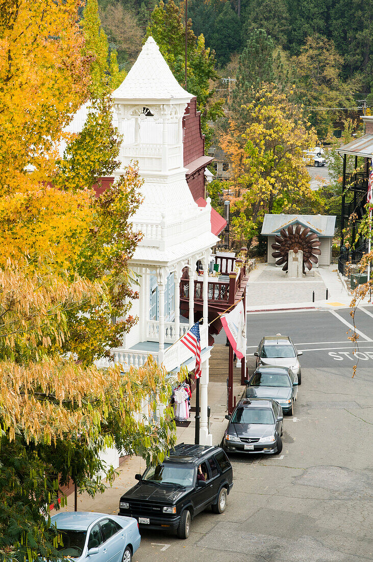 Historic Nevada City firehouse built in 1861 framed by fall leaves